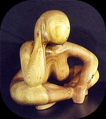 Moment of Reflection - redwood figurative sculpture by Christopher Rebele