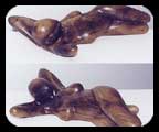 Saturday Morning - walnut figurative sculpture by Christopher Rebele